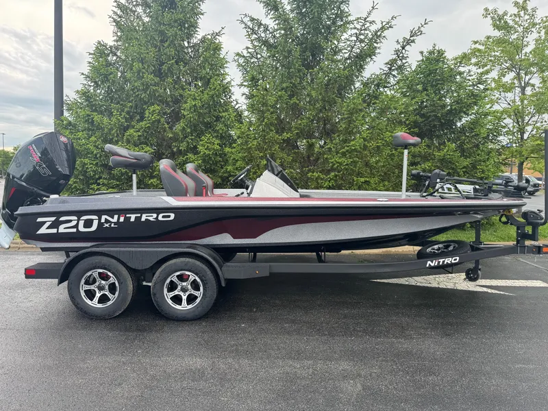 The Image of 2025 Nitro Z20 XL Pro boat on trailer, parked outdoors. - 0