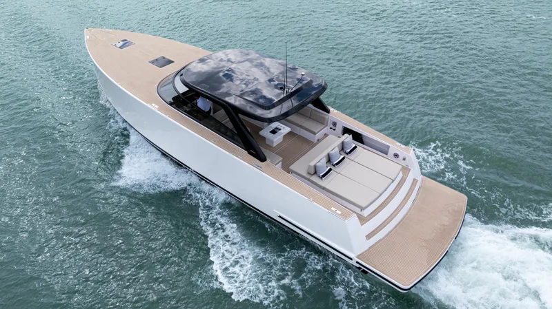 Slide: The Image of 2024 VanDutch 56 luxury yacht cruising on open water. - 4