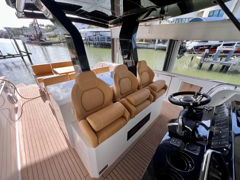 Slide: The Image of 2024 Pardo Yachts P38 interior with luxurious seating and modern helm controls. - 2
