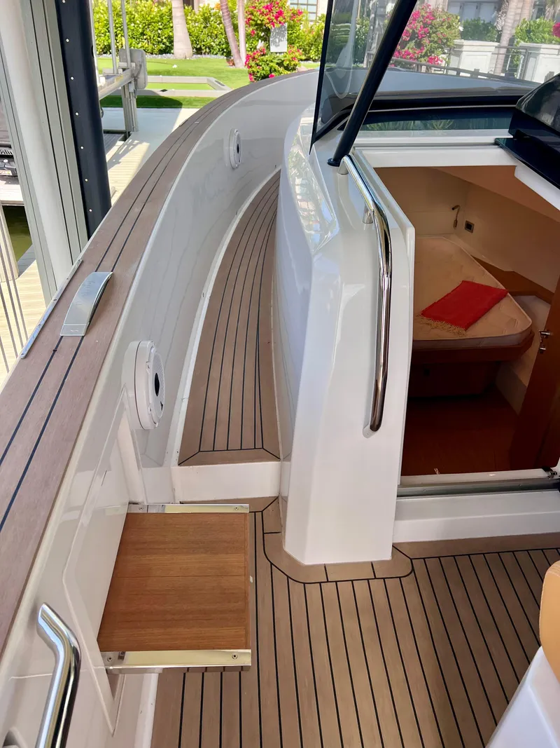Slide: The Image of 2024 Pardo Yachts P38 interior with teak flooring and cabin entrance. - 26