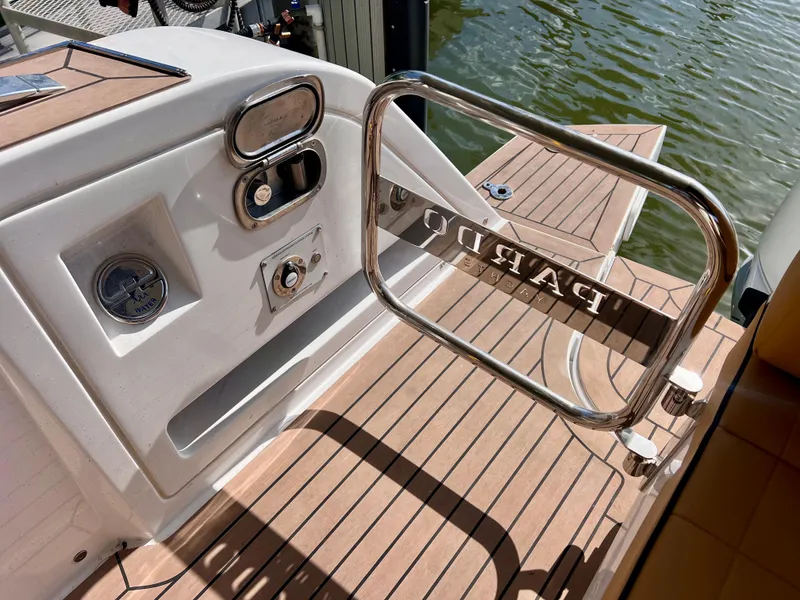 Slide: The Image of 2024 Pardo Yachts P38 deck with teak flooring and stainless steel railing. - 32