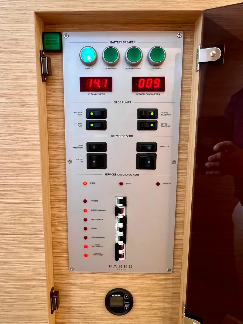Slide: The Image of Control panel of 2024 Pardo Yachts P38, featuring switches and digital displays. - 35