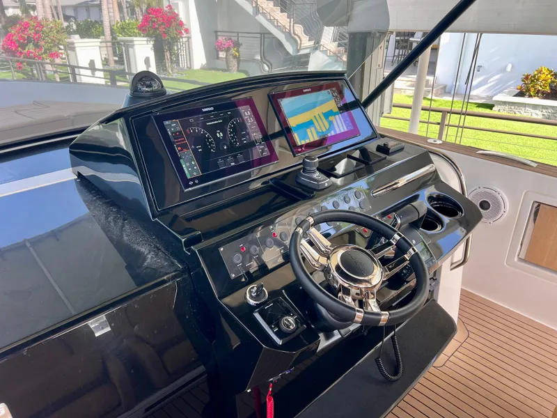 Slide: The Image of Helm of 2024 Pardo Yachts P38, featuring modern navigation displays and controls. - 5