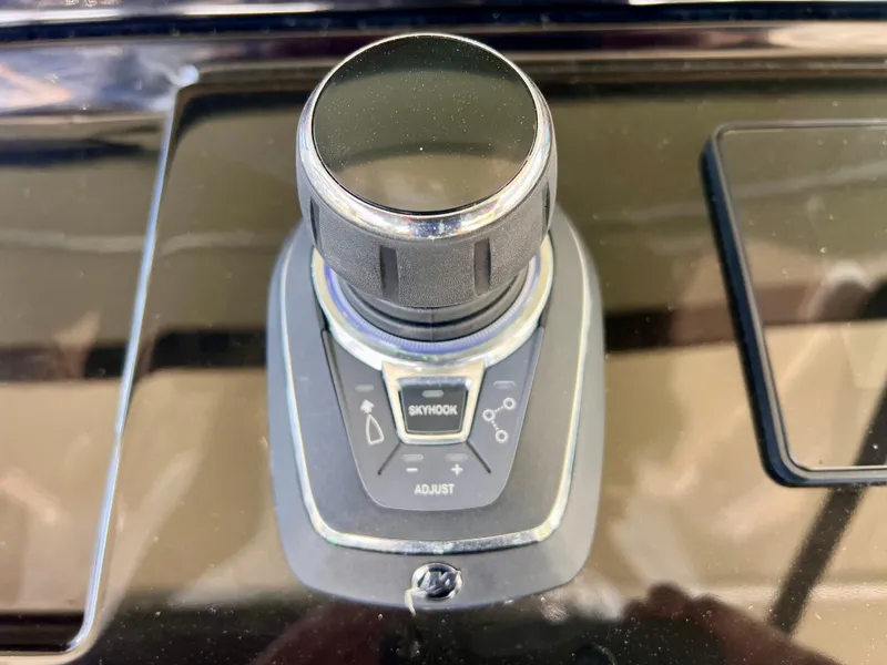 Slide: The Image of Joystick control on 2024 Pardo Yachts P38 dashboard, featuring Skyhook technology. - 7