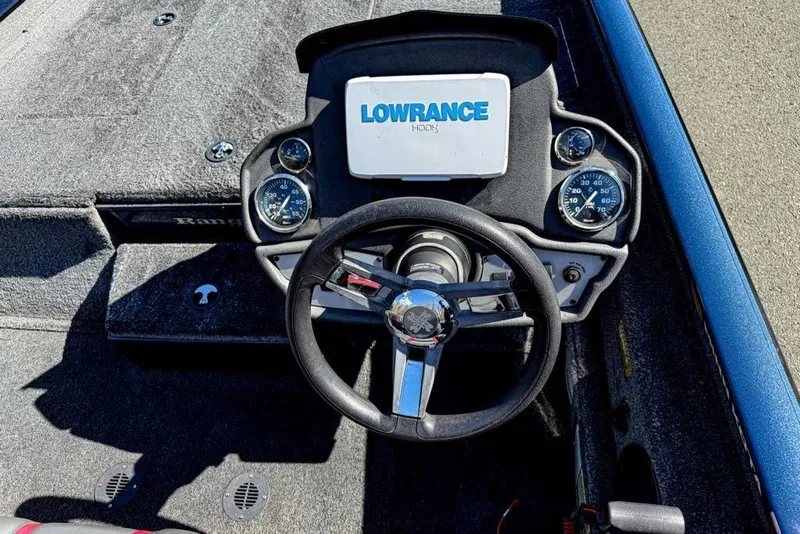 Slide: The Image of 2021 Ranger RT188P boat dashboard with Lowrance electronics and steering wheel. - 3