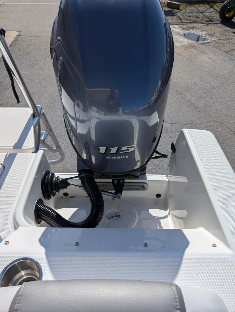 Slide: The Image of 2018 World Cat 230DC boat with Yamaha 115 engine, rear view. - 22