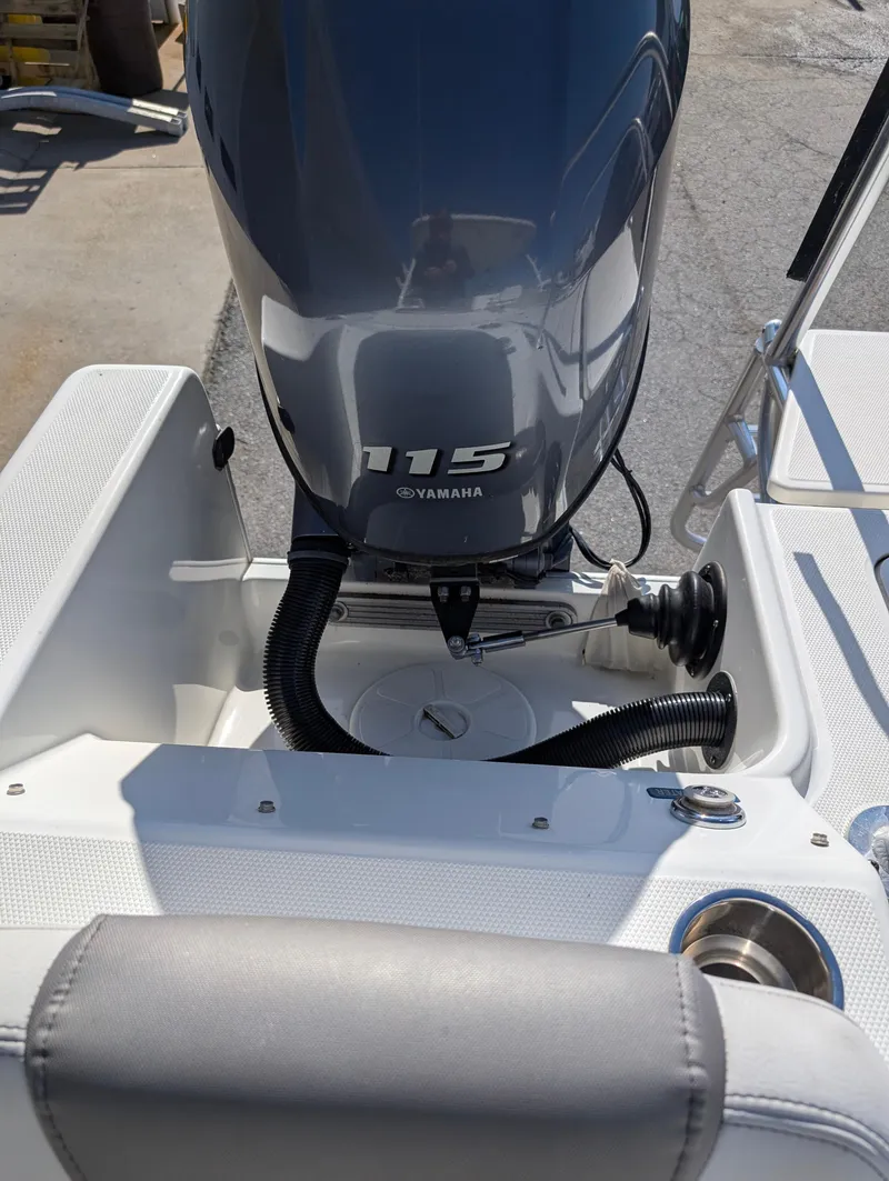 Slide: The Image of 2018 World Cat 230DC boat with Yamaha 115 engine, rear view. - 23