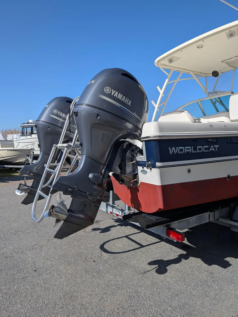 Slide: The Image of 2018 World Cat 230DC boat with Yamaha outboard motors on a trailer. - 29