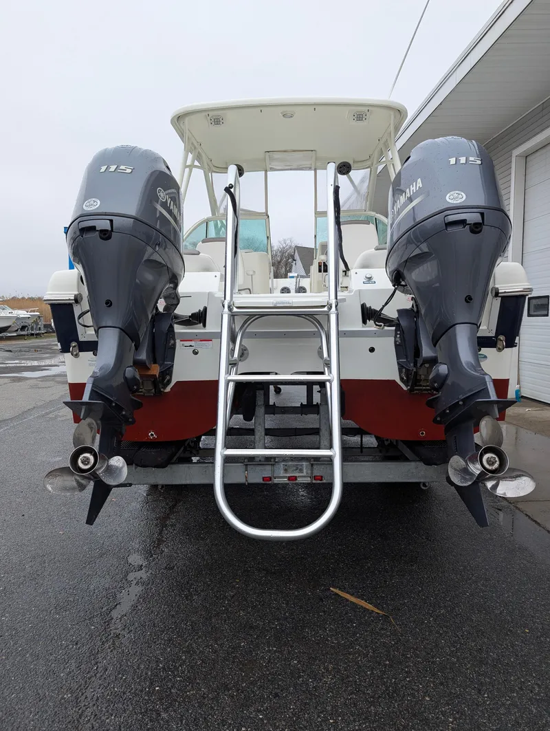Slide: The Image of 2018 World Cat 230DC boat with dual Yamaha outboard engines, rear view. - 30
