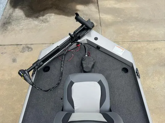 Slide: The Image of 2025 Lowe Skorpion 16 boat interior with trolling motor and seating. - 4