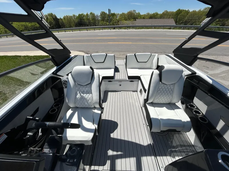 Slide: The Image of 2025 Yamaha Boats 222S interior with sleek seating and modern design. - 12