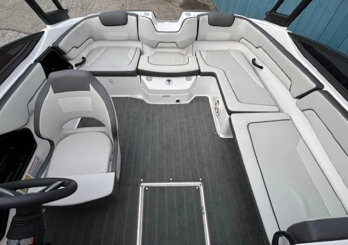 Slide: The Image of 2022 Yamaha Boats AR190 interior with spacious seating and modern design. - 22