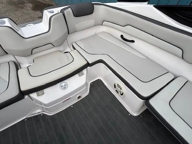 Slide: The Image of 2022 Yamaha Boats AR190 interior seating with sleek, modern design and comfortable upholstery. - 23