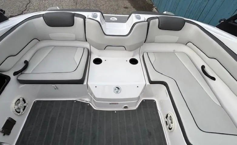 Slide: The Image of 2022 Yamaha Boats AR190 interior with spacious seating and cup holders. - 26