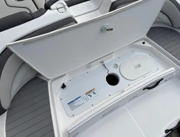 Slide: The Image of Open storage compartment in 2022 Yamaha AR190 boat, showcasing interior design and functionality. - 31