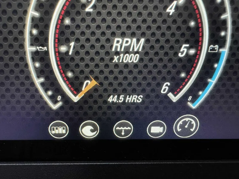 Slide: The Image of 2023 Malibu 25 LSV dashboard displaying RPM gauge and 44.5 engine hours. - 11