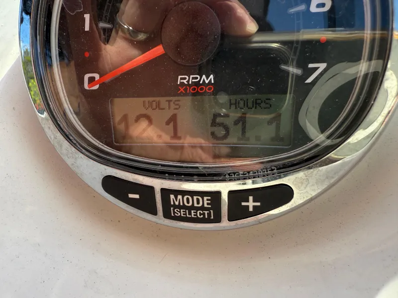 Slide: The Image of Close-up of Heyday WT-2DC 2023 boat gauge showing 12.1 volts and 51.1 hours. - 13