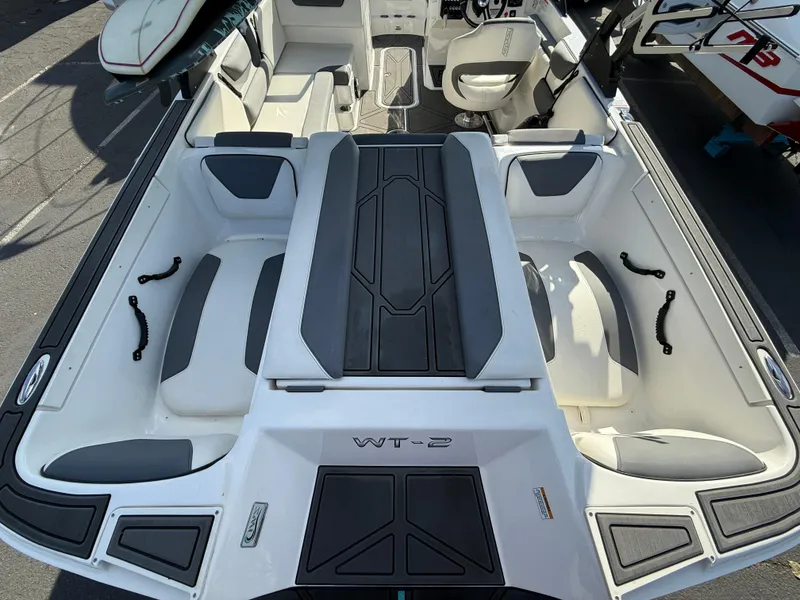 Slide: The Image of 2023 Heyday WT-2DC boat interior with seating and storage compartments. - 6