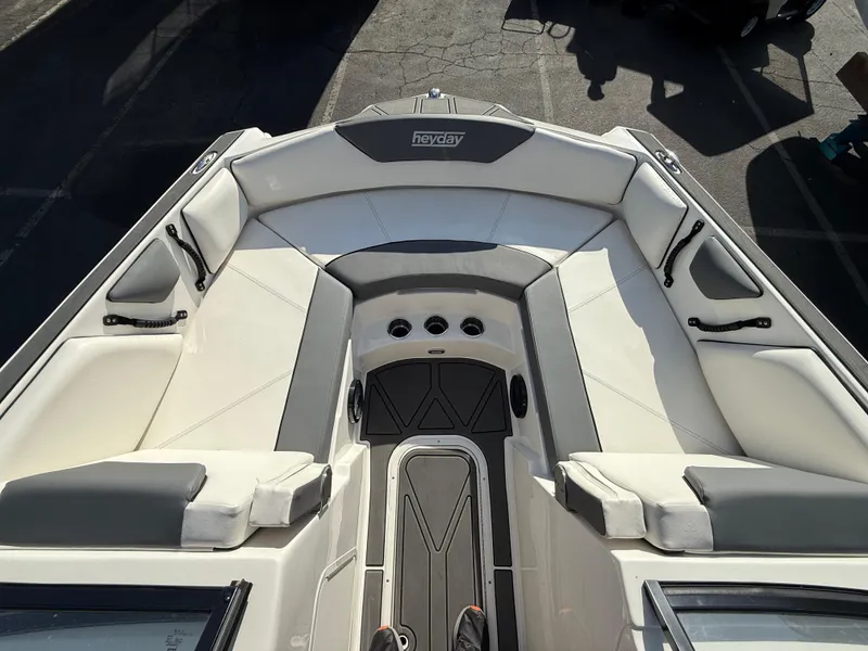 Slide: The Image of 2023 Heyday WT-2DC boat interior with spacious seating and modern design. - 7