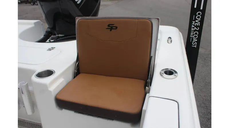 Slide: The Image of 2025 Sea Pro 230 Bay boat seat with cup holders and logo. - 10