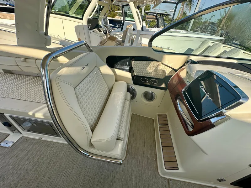 Slide: The Image of Luxurious interior of 2025 Chris-Craft Launch GT 31 boat with elegant seating and dashboard. - 7