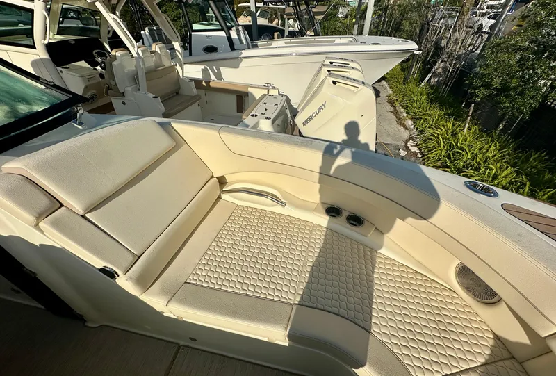 Slide: The Image of 2025 Chris-Craft Launch GT 31 boat interior with luxurious seating and modern design. - 9