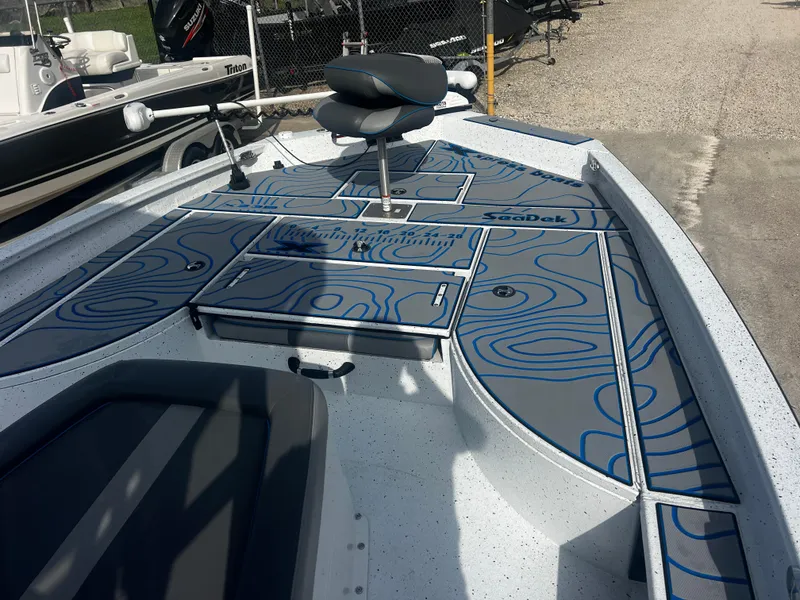 Slide: The Image of 2023 Xpress X23B Lounge boat with stylish deck design and seating. - 12