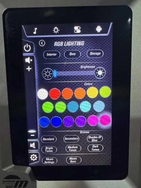 Slide: The Image of Touchscreen displaying RGB lighting controls in a 2022 Malibu M240 boat. - 10