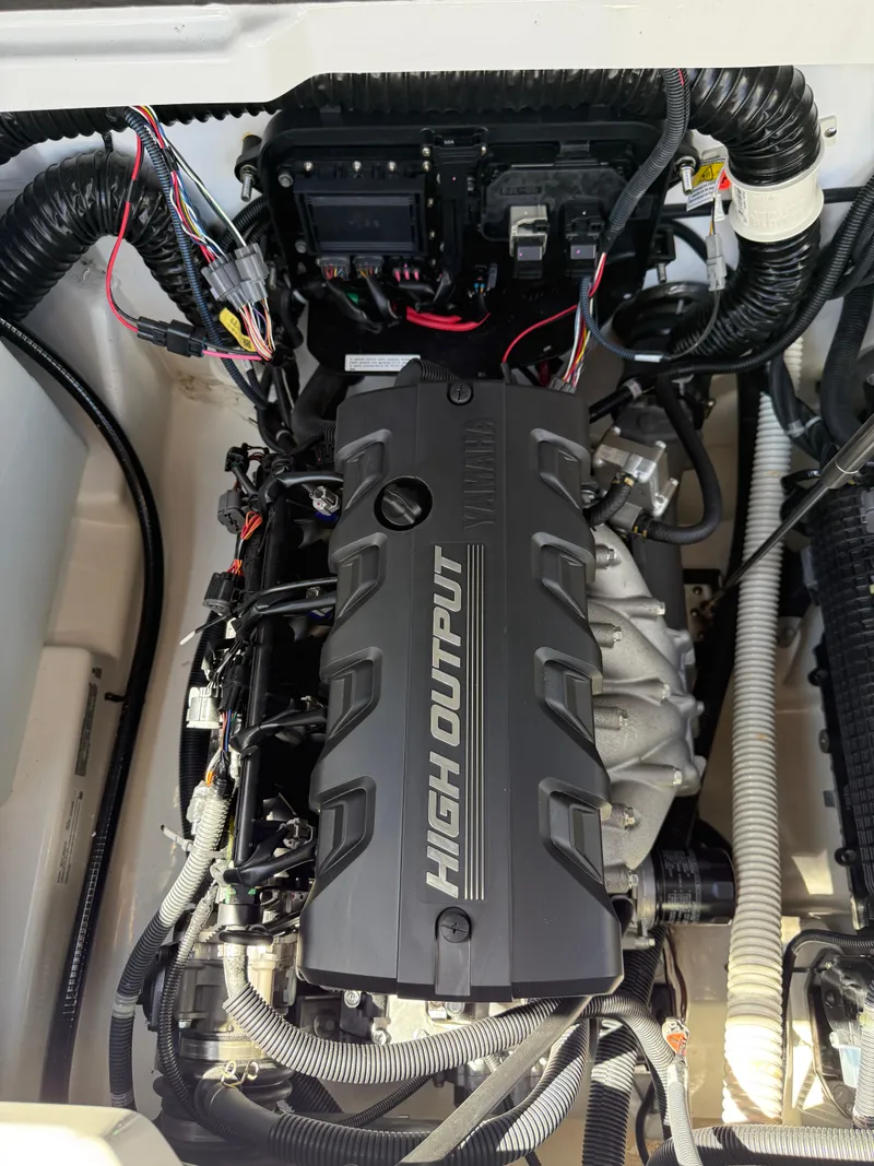 Slide: The Image of 2022 Yamaha Boats 252SD high output engine, detailed view of components and wiring. - 10
