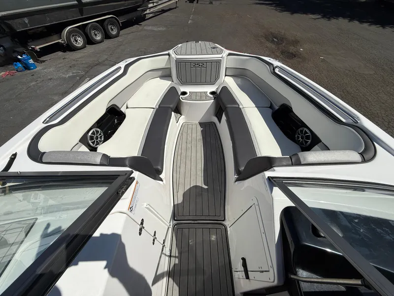 Slide: The Image of 2022 Yamaha Boats 252SD interior with sleek seating and modern design. - 13