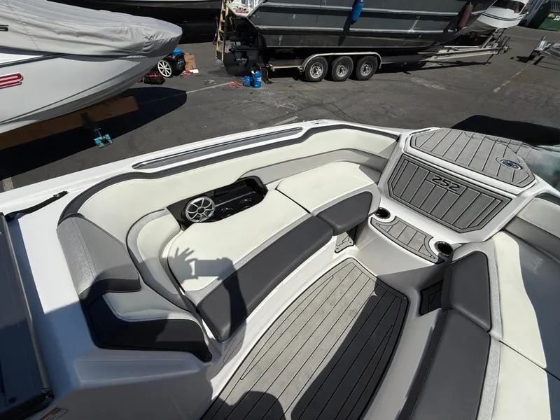 Slide: The Image of 2022 Yamaha Boats 252SD interior with sleek seating and modern design. - 14