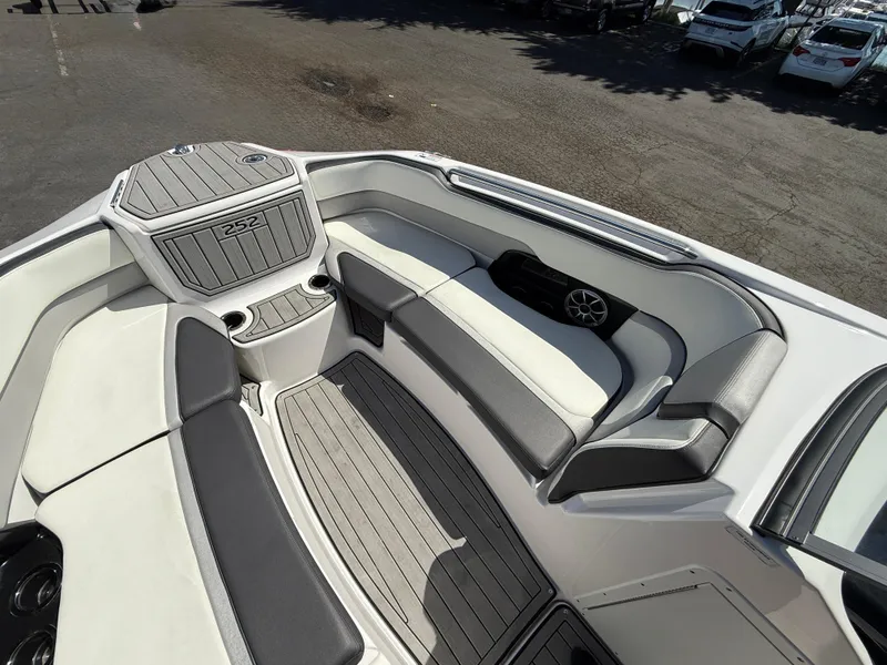 Slide: The Image of 2022 Yamaha Boats 252SD interior with sleek seating and modern design. - 15