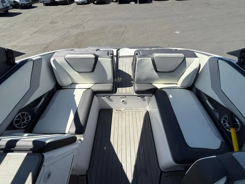 Slide: The Image of 2022 Yamaha Boats 252SD interior with sleek seating and modern design. - 7