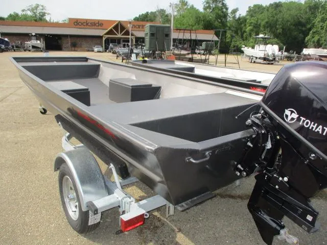 Slide: The Image of 2025 Weldcraft 1548-14219 boat with Tohatsu motor on trailer, dockside background. - 1