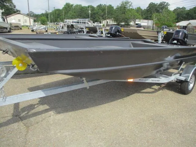 Slide: The Image of 2025 Weldcraft 1548-14219 boat on trailer, parked outdoors. - 2