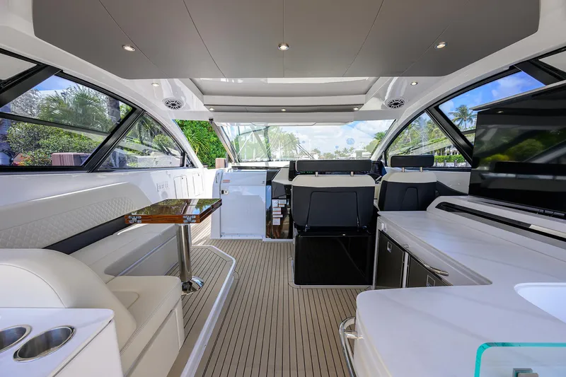Slide: The Image of Luxurious interior of 2024 Cruisers Yachts GLS-OB with sleek seating and modern design. - 11