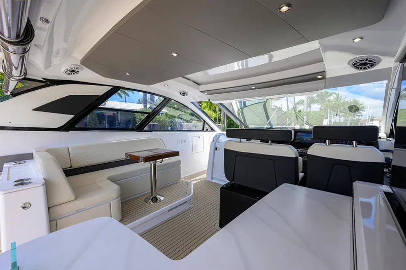 Slide: The Image of 2024 Cruisers Yachts GLS-OB interior with luxurious seating and modern design. - 14