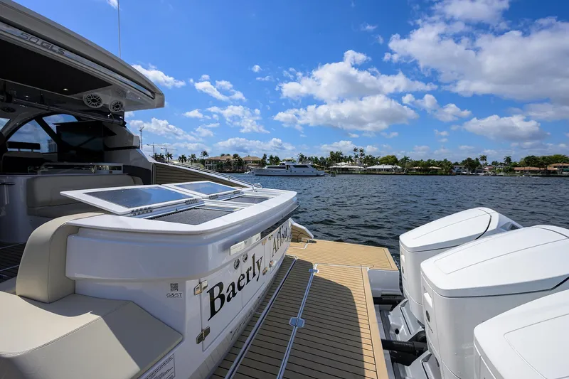 Slide: The Image of 2024 Cruisers Yachts GLS-OB on water, showcasing luxury design and powerful engines. - 34