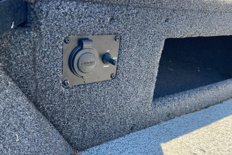 Slide: The Image of Crestliner FishHawk 1650 boat interior with power outlet, 2021 model. - 6