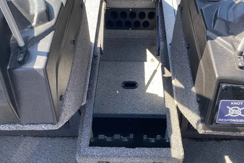 Slide: The Image of 2021 Crestliner FishHawk 1650 boat interior with storage compartments. - 9