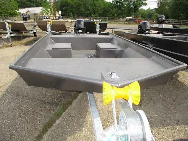 Slide: The Image of 2025 Weldcraft 1548-14224 CAJUN boat on trailer, parked outdoors. - 2