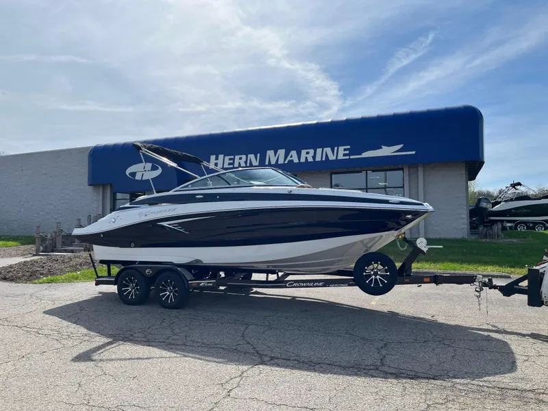 The Image of 2025 Crownline Eclipse E235 boat on trailer outside Hern Marine dealership. - 0