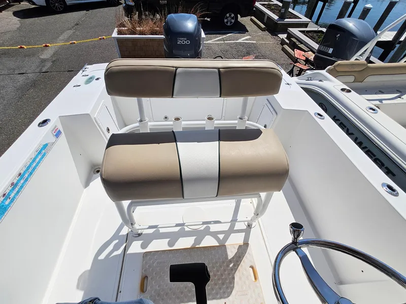 Slide: The Image of 2007 Seastrike 220 B boat interior with beige seating and steering wheel. - 18