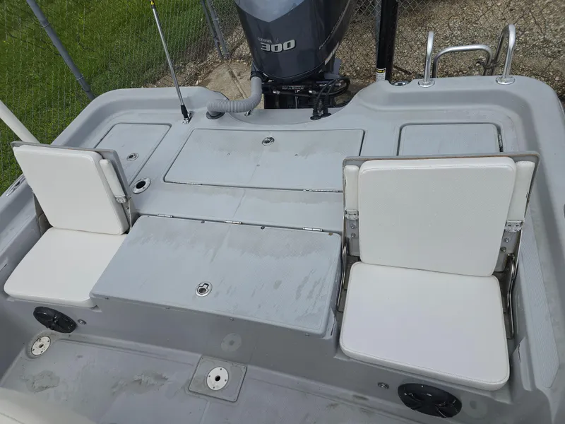 Slide: The Image of 2016 Blue Wave 2400 PureBay boat with seating and Yamaha 300 engine. - 10