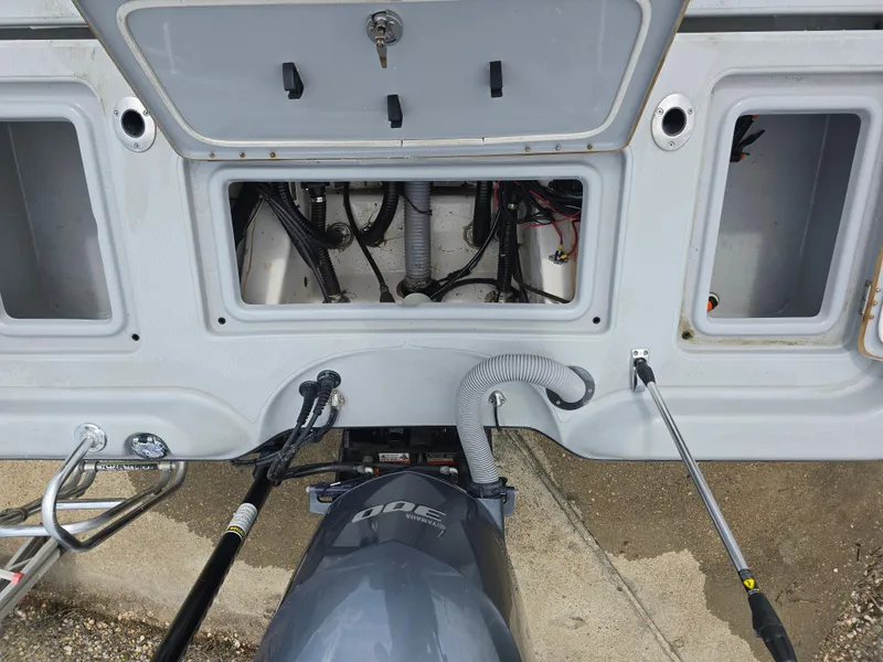 Slide: The Image of 2016 Blue Wave 2400 PureBay boat engine compartment with open access panel. - 12