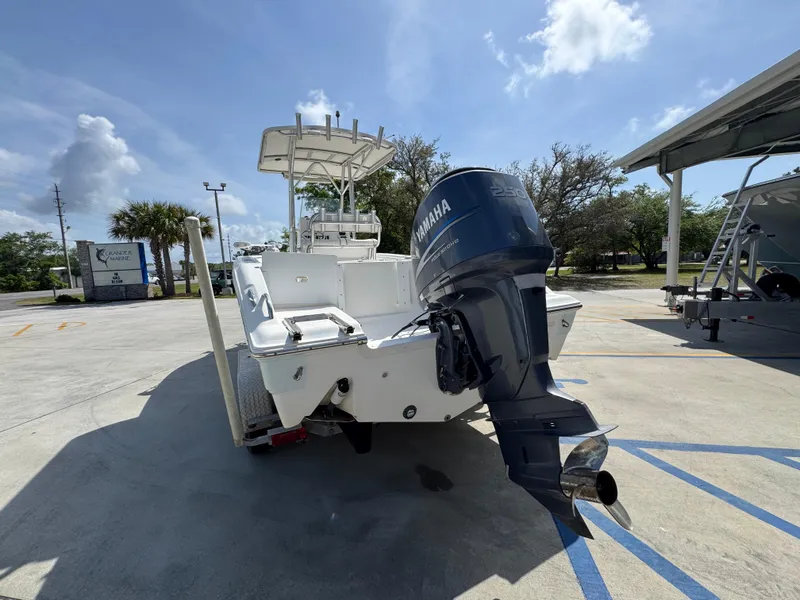 Slide: The Image of 2011 Sea Fox 236 Center Console boat with Yamaha outboard motor in parking lot. - 18