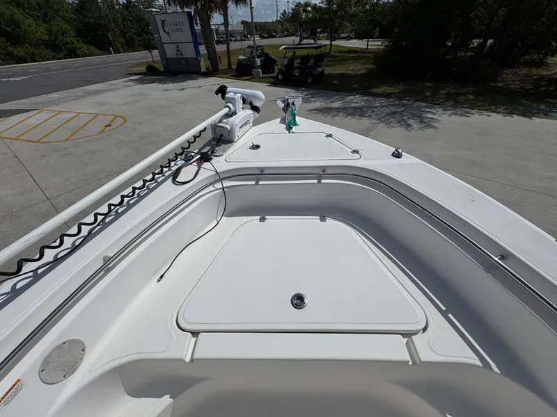 Slide: The Image of 2011 Sea Fox 236 Center Console boat deck with storage compartment and railing. - 22