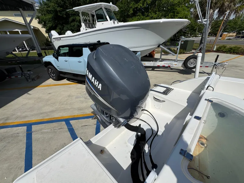 Slide: The Image of 2011 Sea Fox 236 Center Console boat with Yamaha outboard motor on trailer. - 42