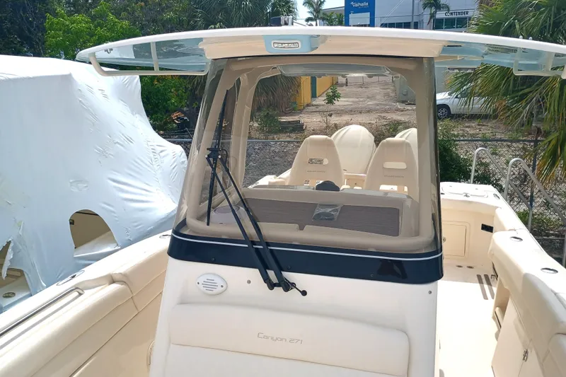 Slide: The Image of 2025 Grady-White Canyon 271 boat with spacious seating and modern design. - 20