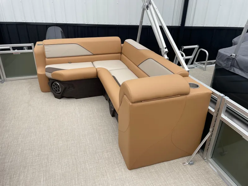 Slide: The Image of 2025 Tahoe Pontoon 2185 CRB with tan seating and modern design. - 14
